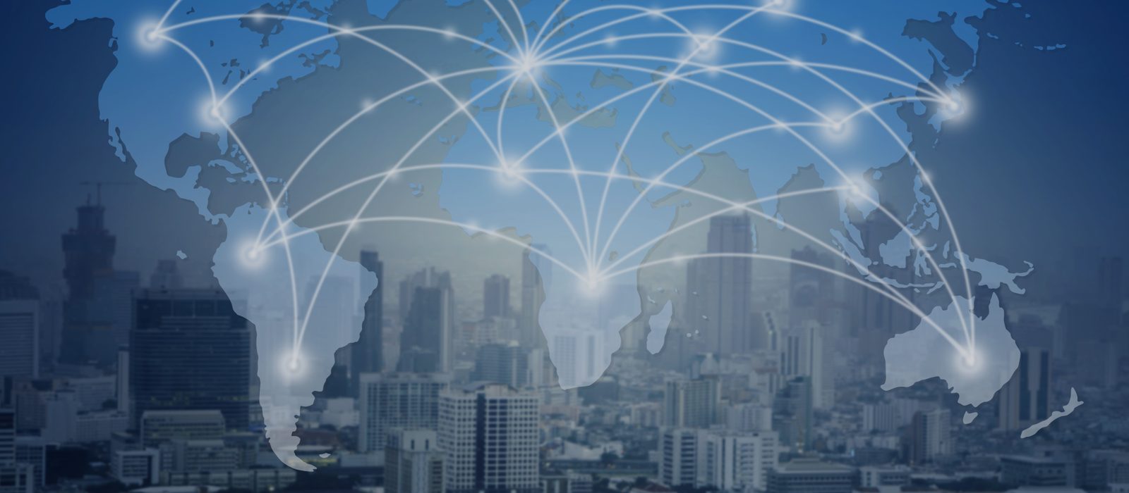 World map of global payment connections over a city skyline