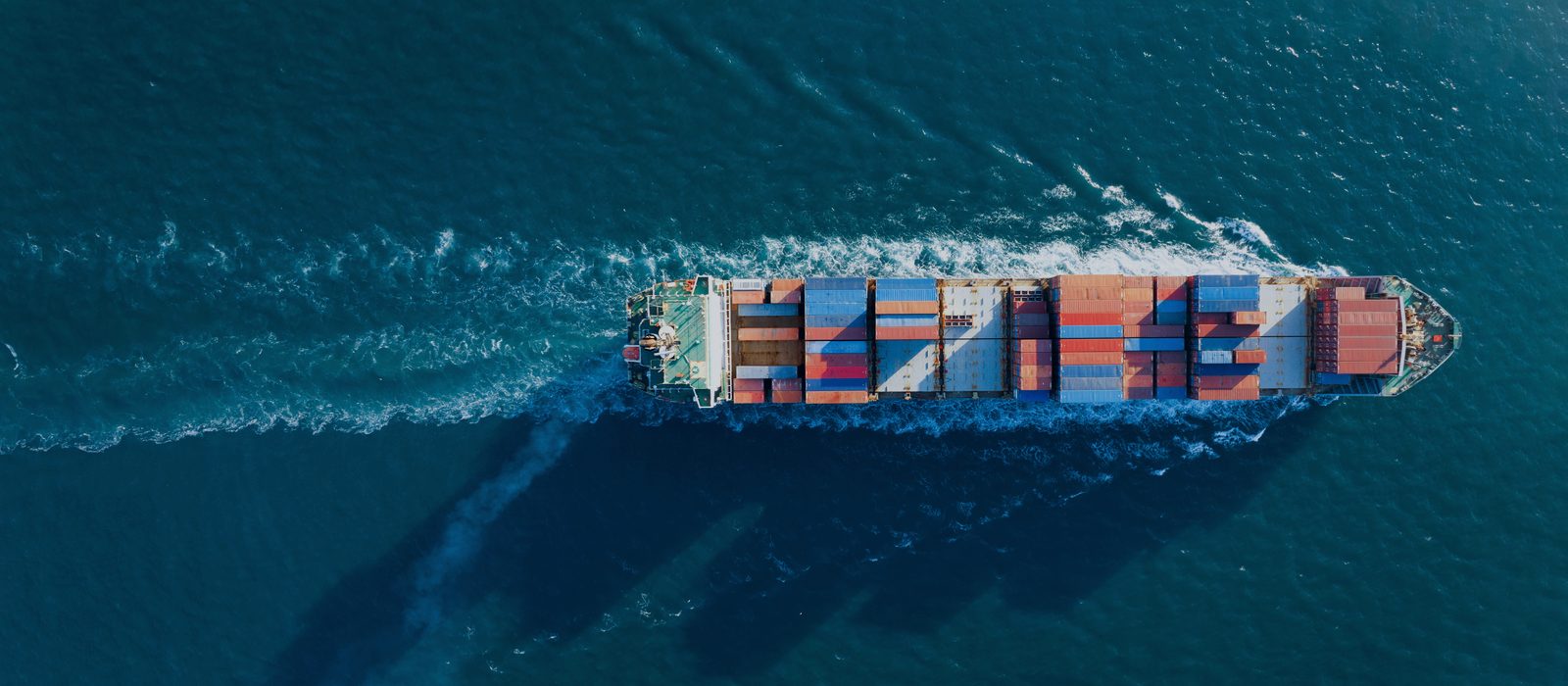 Container ship carrying cargo on the UAE to China trade route